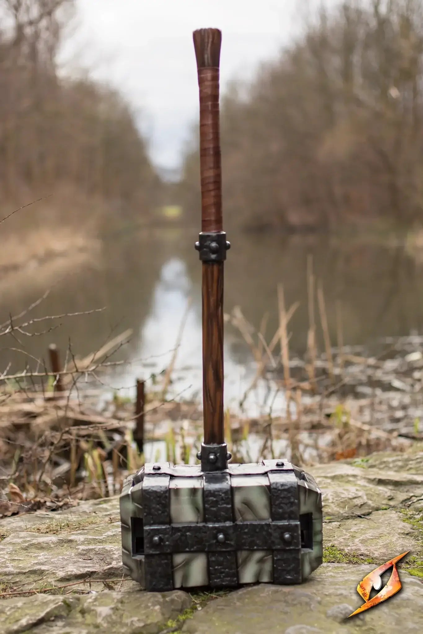 foam hammer against tranquil nature backdrop.