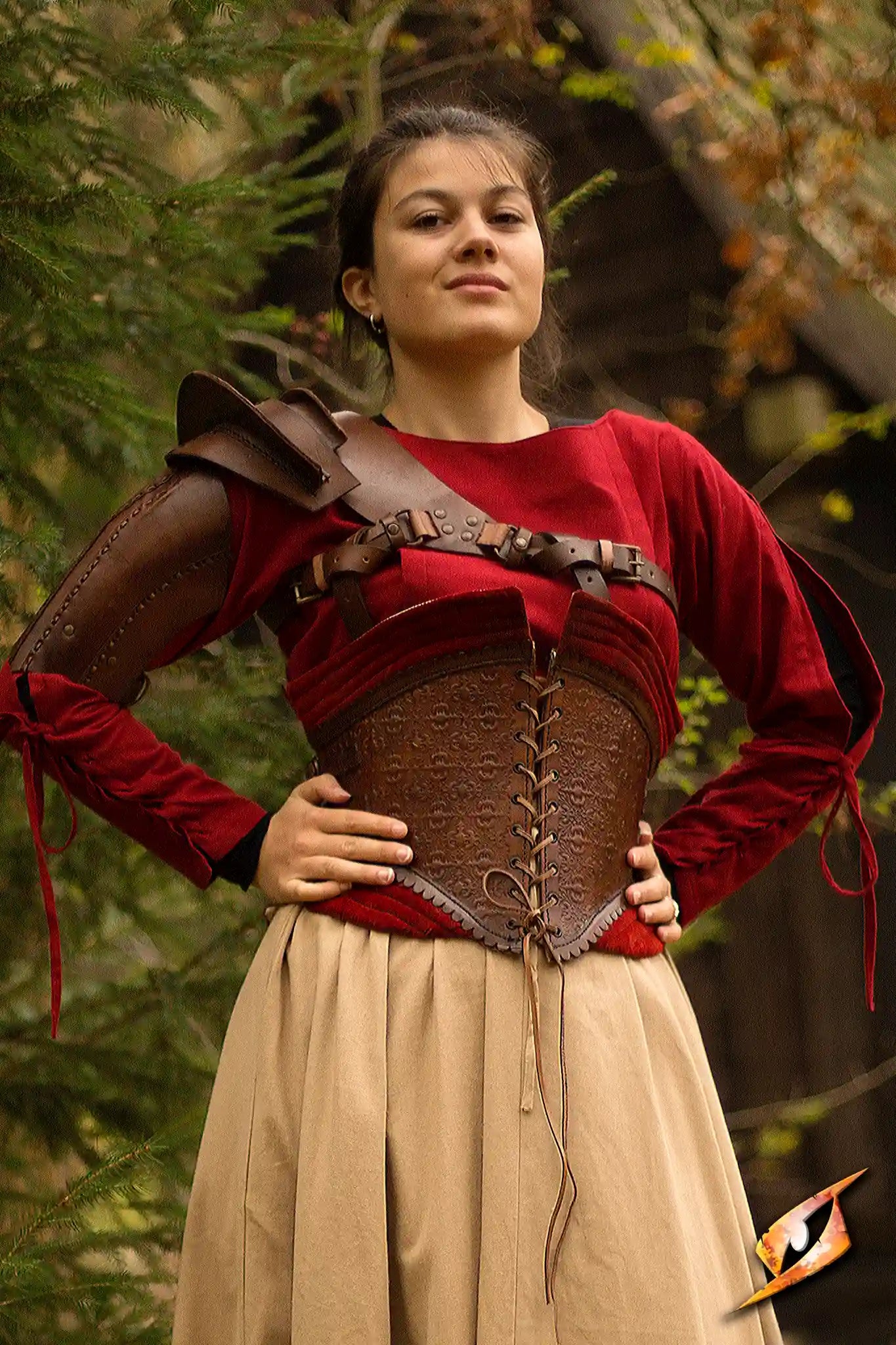 Corsets: A model showcasing a detailed brown corset paired with a red top and a medieval-inspired outfit.