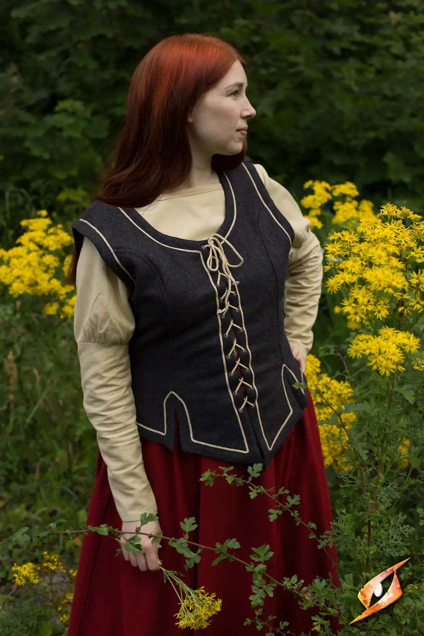 Medieval woman wearing a stylish vest surrounded by yellow flowers, showcasing Vests in fantasy attire.