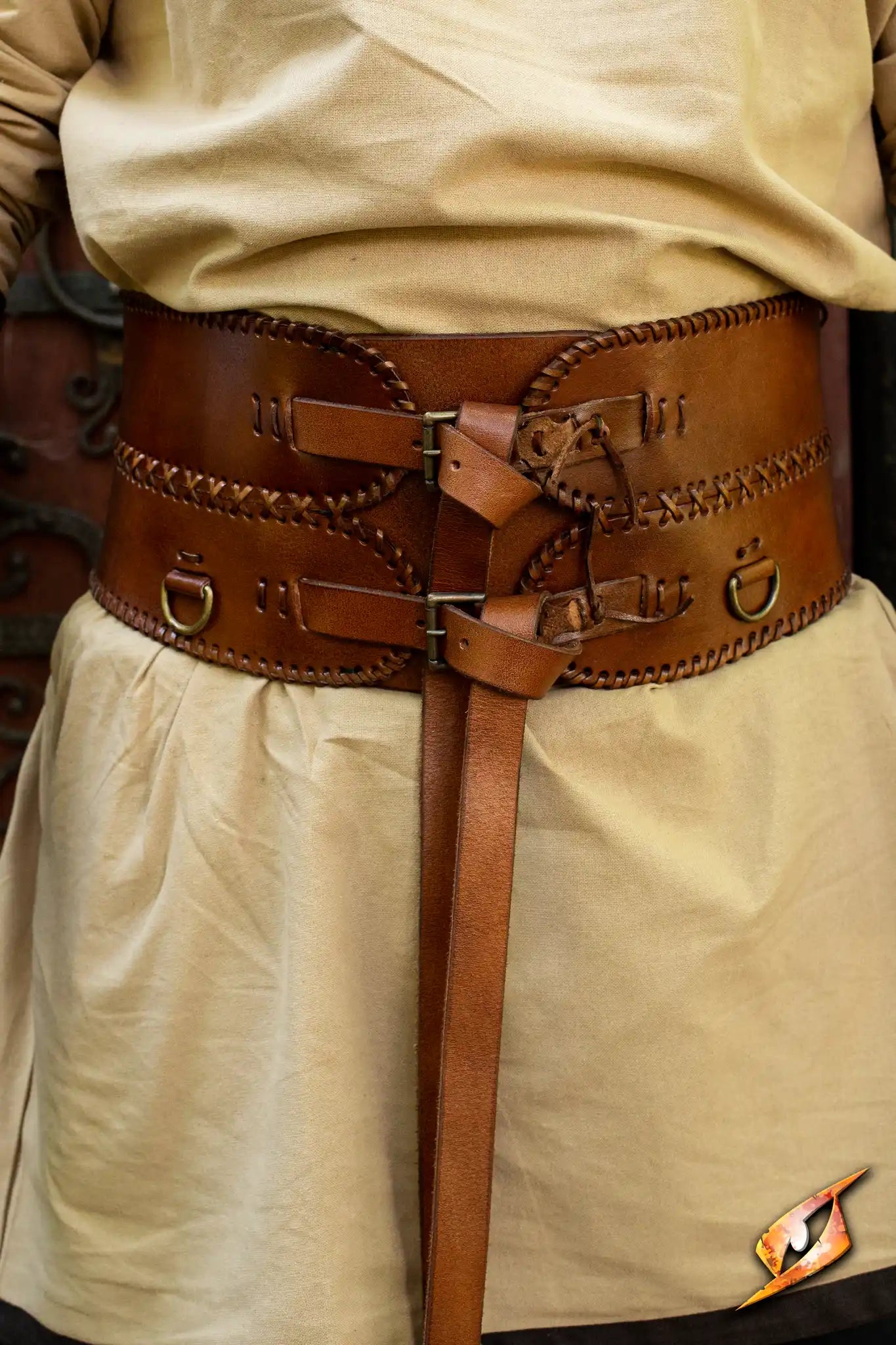 Broad Belt worn by a person, showcasing its heavy leather design and D-rings for attaching equipment.