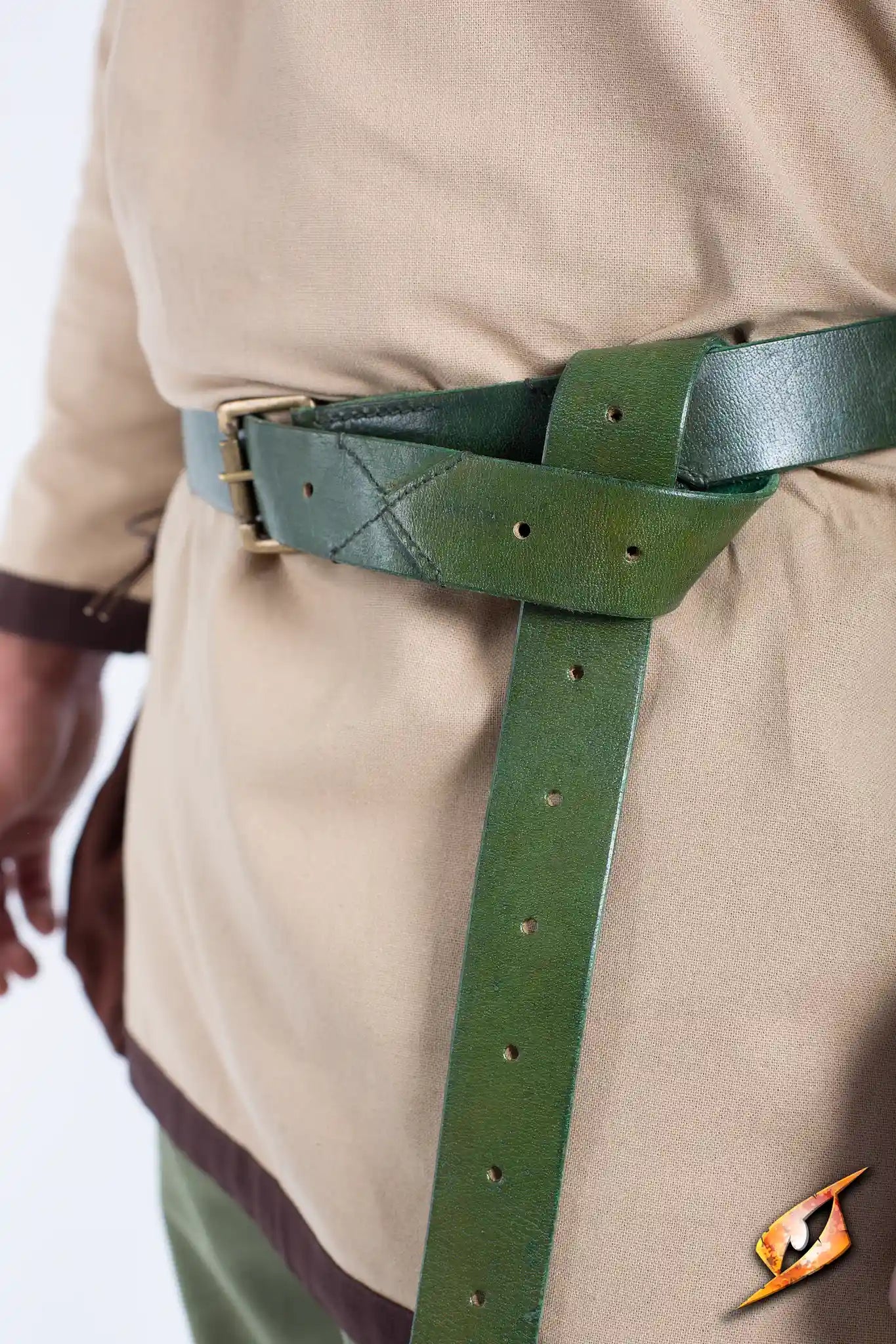 X-Belt securely fastened around a waist, showcasing its green leather design and durable buckle for outdoor use.