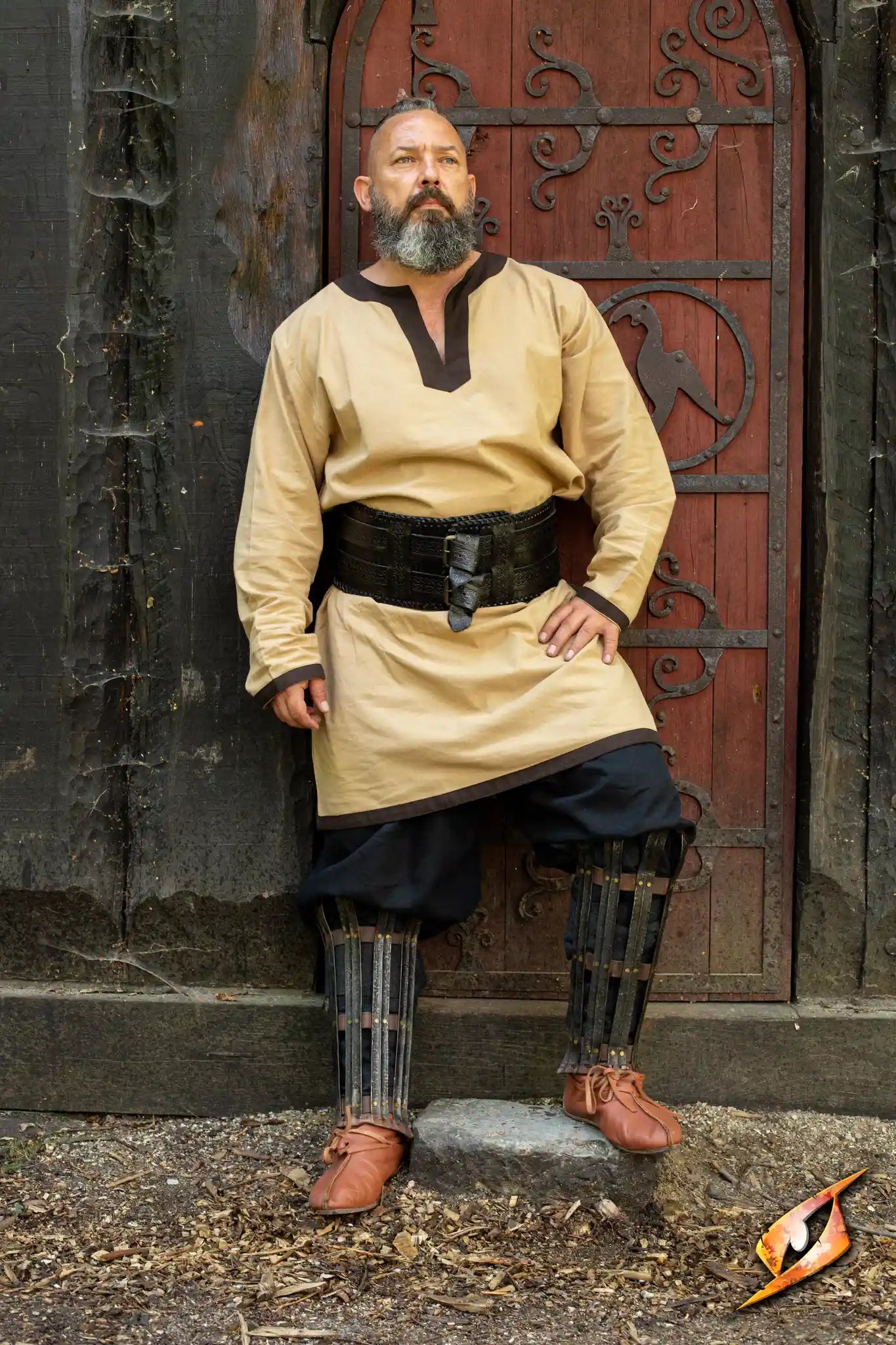 A warrior dressed in traditional attire, showcasing a sturdy Barbarian Belt for carrying gear.