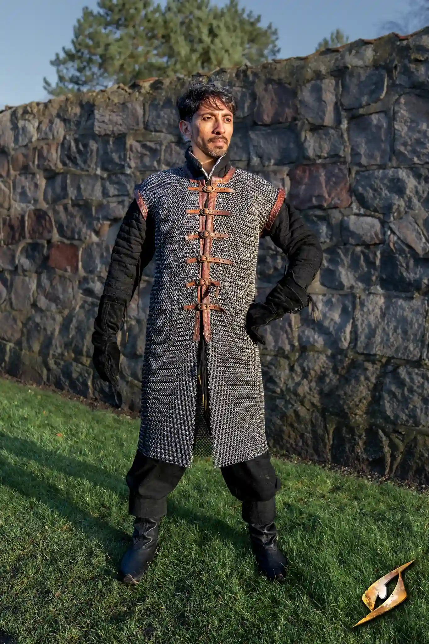 Scout Chainmail worn by a model, showcasing its unique chain mail design and leather trim outdoors.