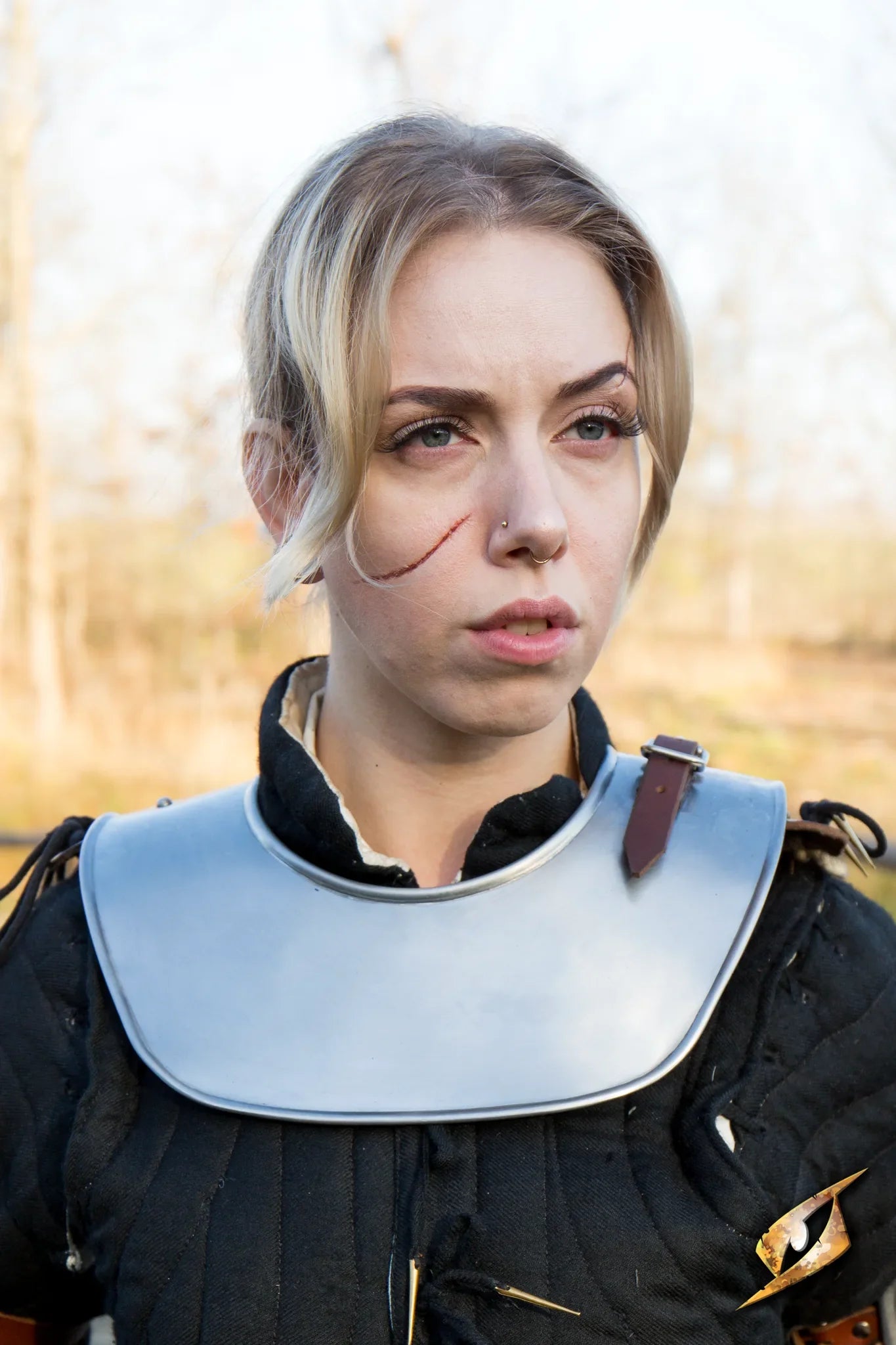 Close-up of a person wearing a Soldier Gorget, showcasing its simple design and protective features for the battlefield.