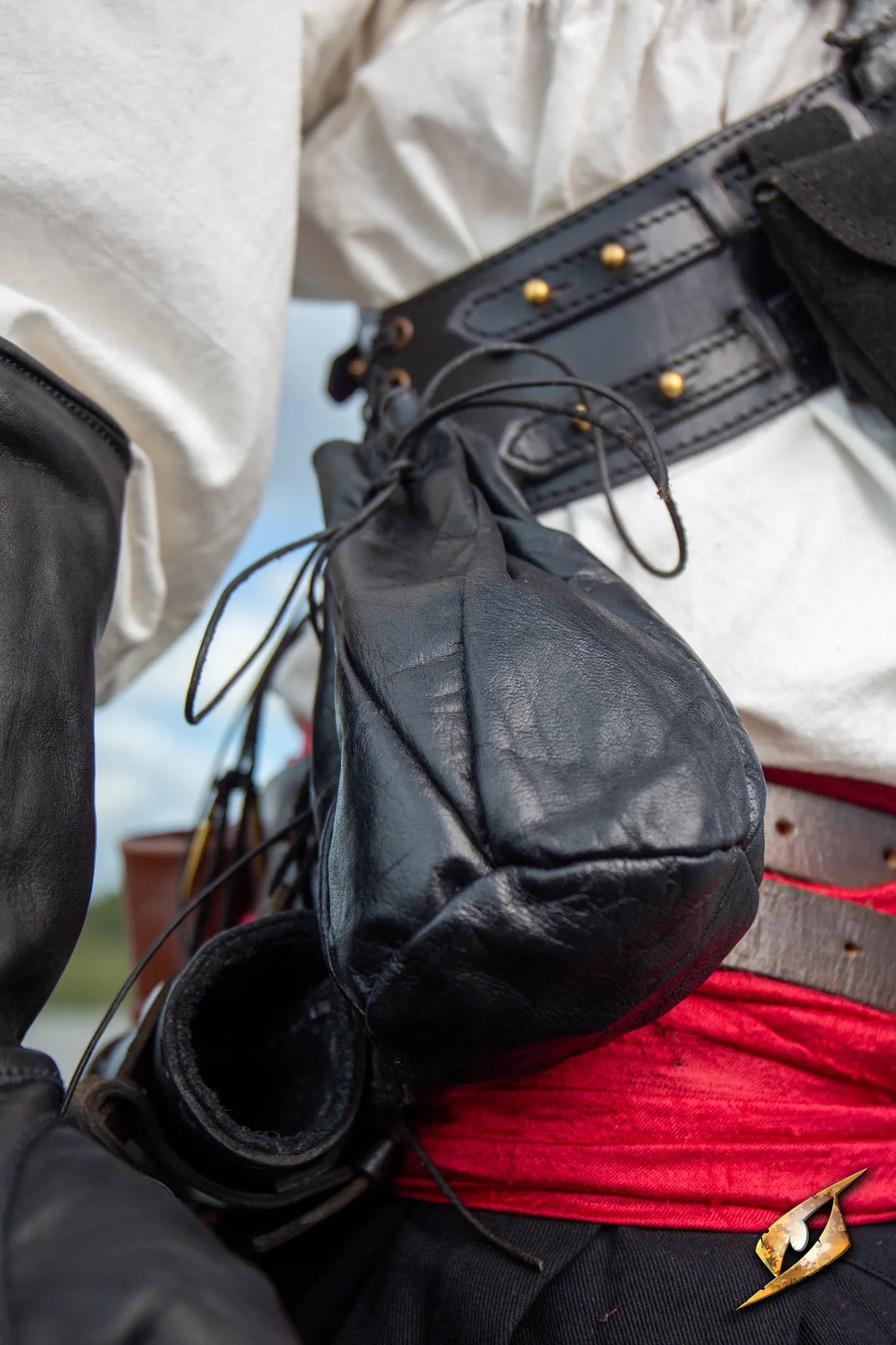 Bounty Hunter Pouch crafted from sturdy leather, perfect for carrying coins and essentials, featuring a timeless design.