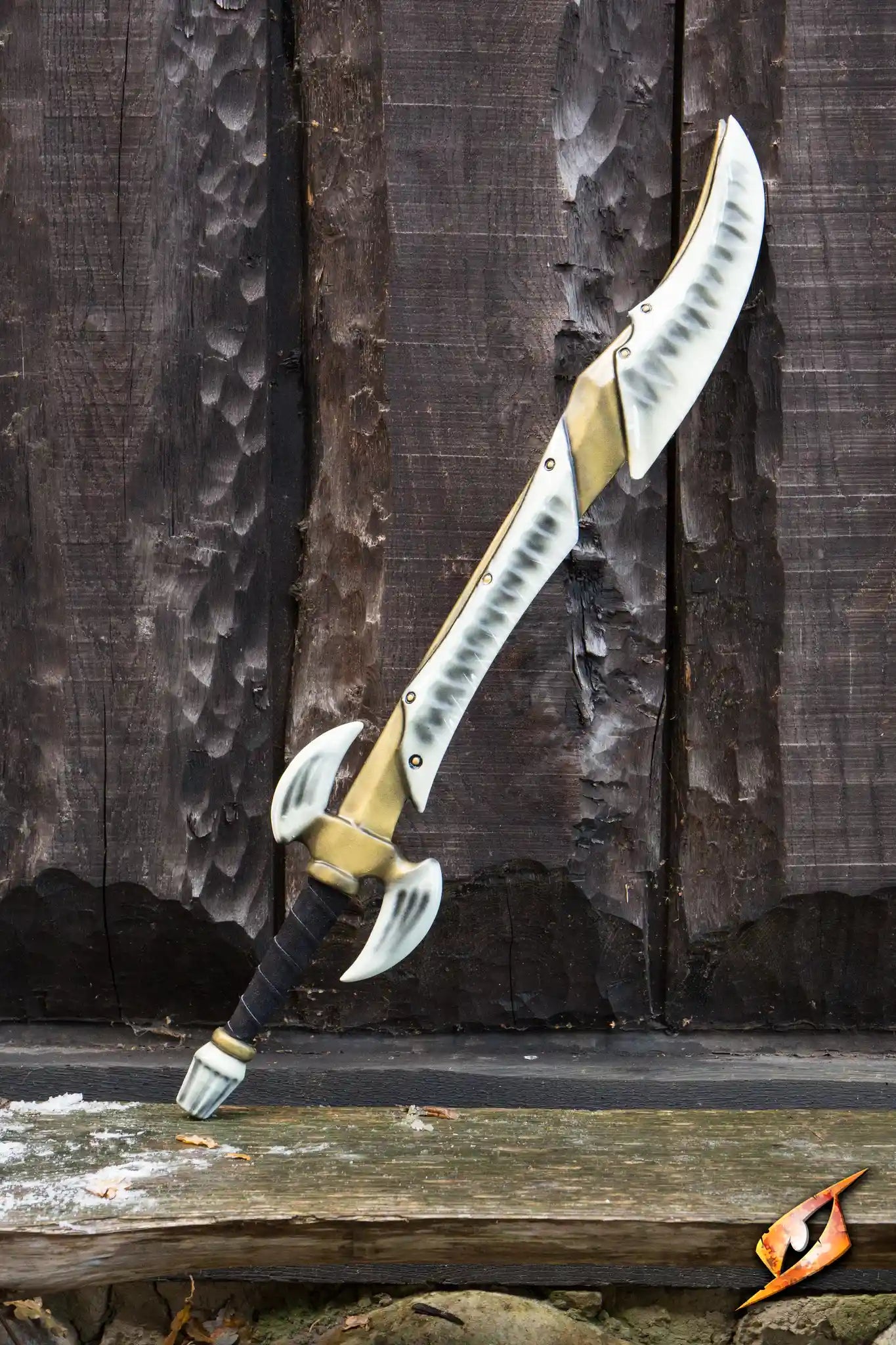 Bone Blade - 95 cm sword with a bone-white curved blade and horned crossguard displayed against a rustic wooden backdrop.