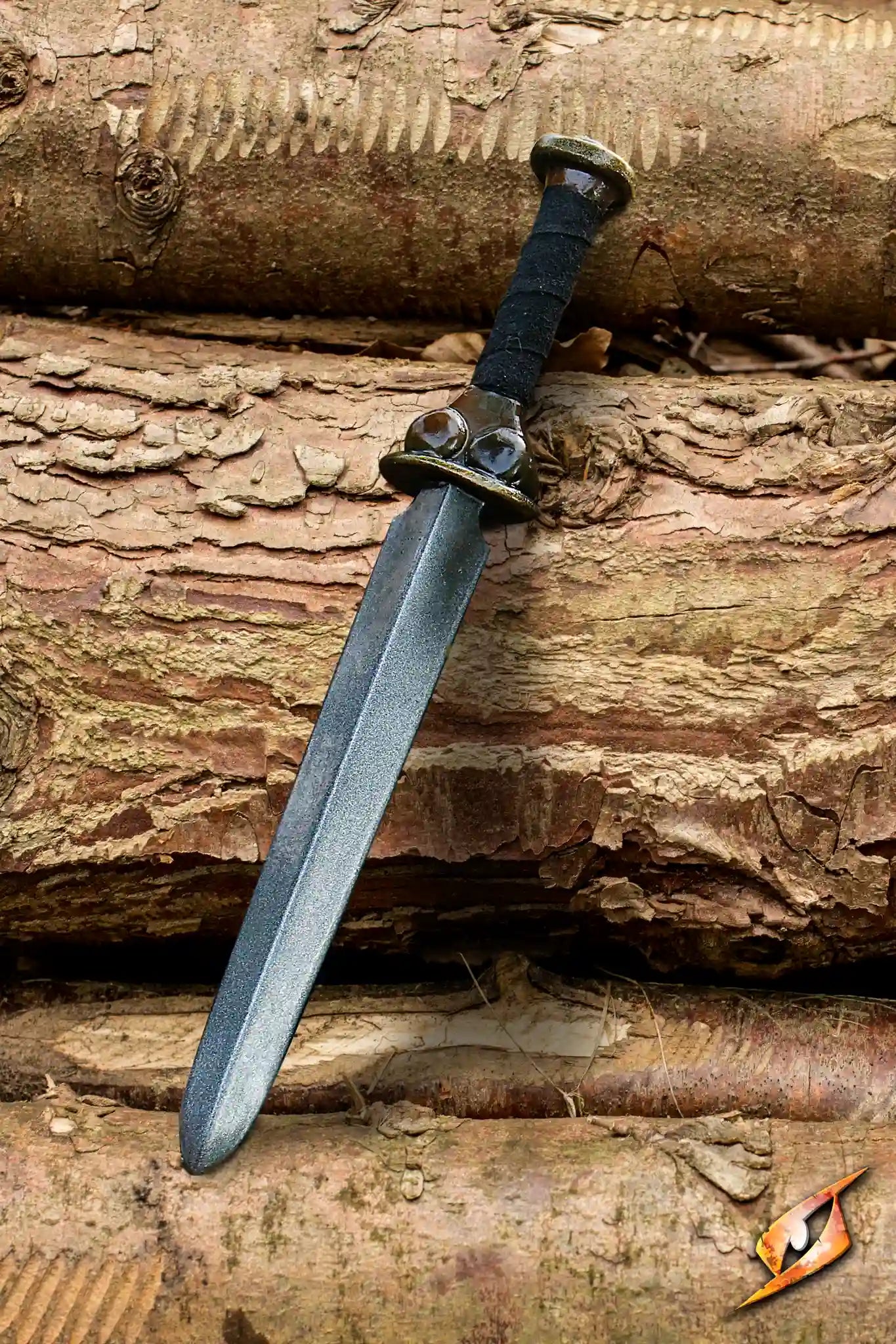 Bollocks Dagger - 45 cm, two-edged dagger with a black leather handle, displayed against a textured wood background.