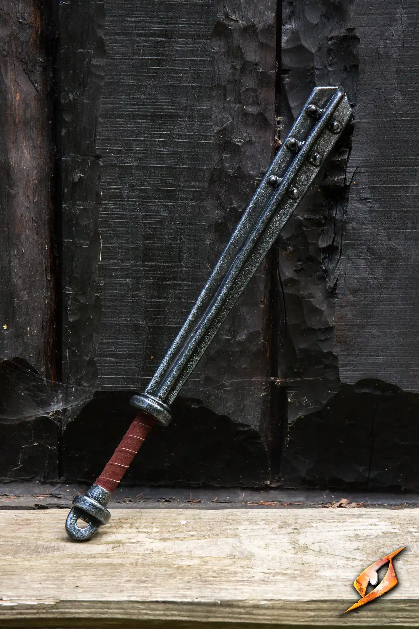 Barmace against a wooden backdrop, showcasing its intimidating design and grip, perfect for tough street encounters.