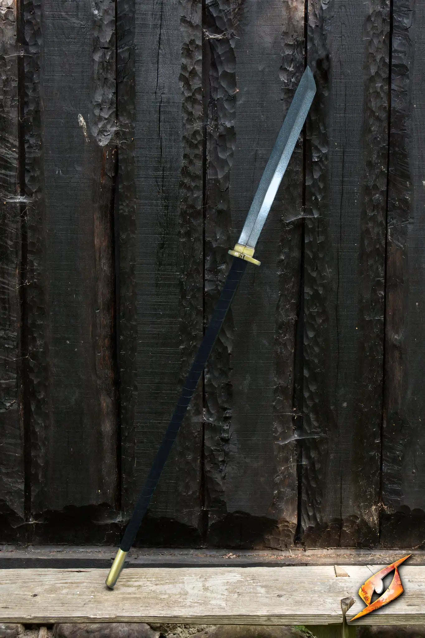 Spear Naginata - 180 cm displayed against a rustic wooden backdrop, showcasing its blade and handle.