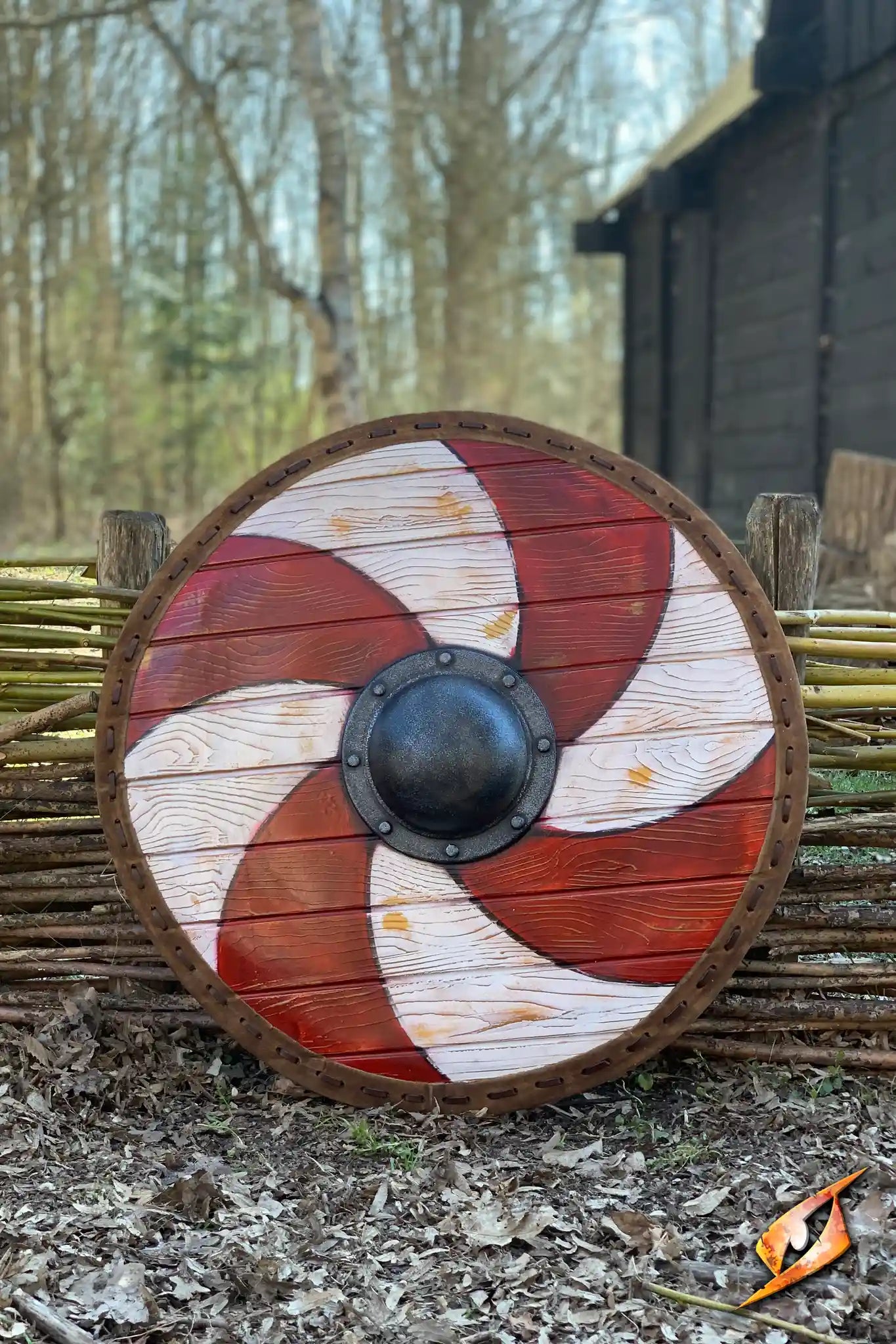 Thegn Shield featuring a red and white design, 70 cm round latex shield for coastal raids and offensive fighting.