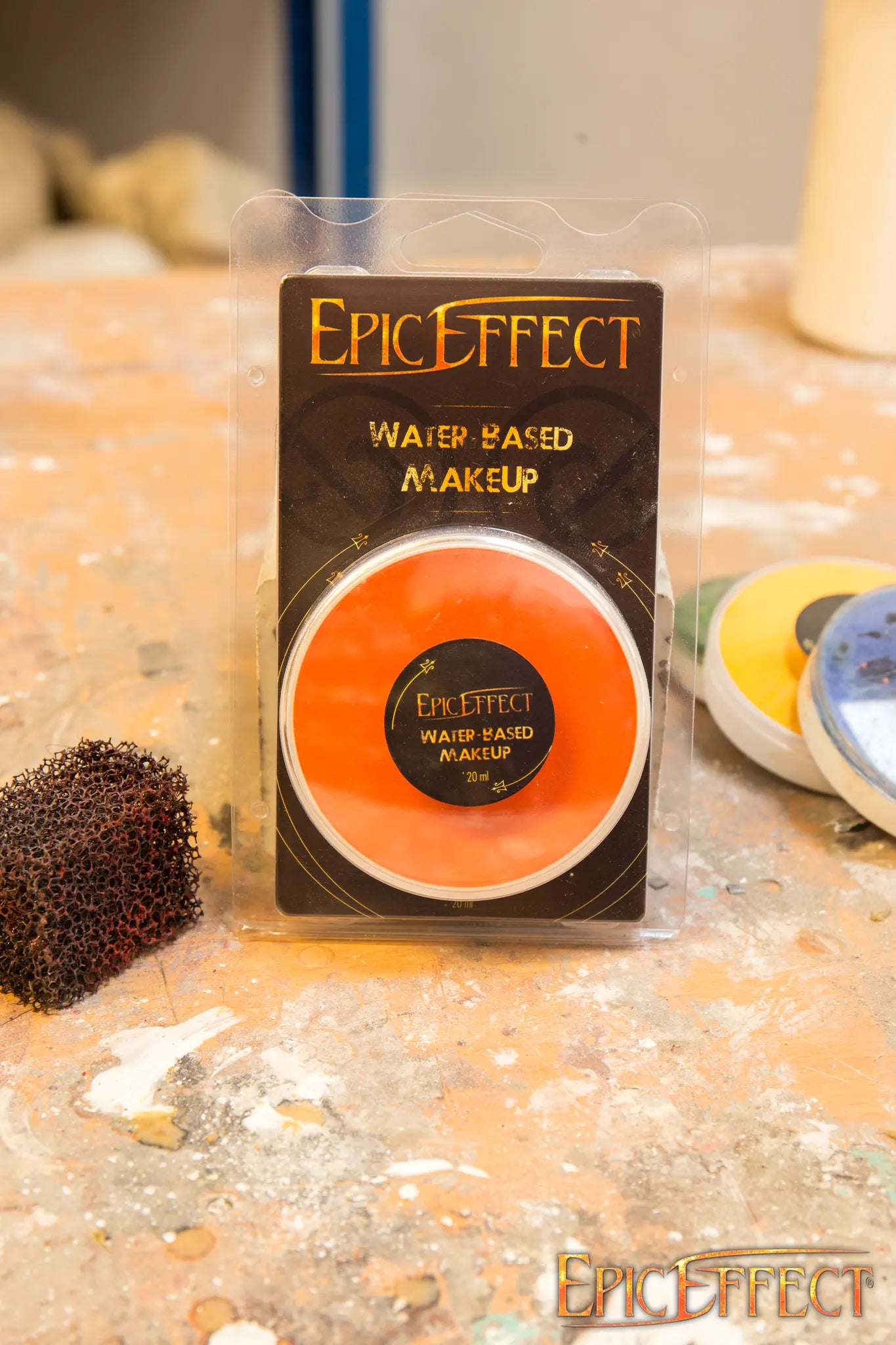 Water Based Make Up - Orange by Epic Effects in a compact packaging on a work surface.