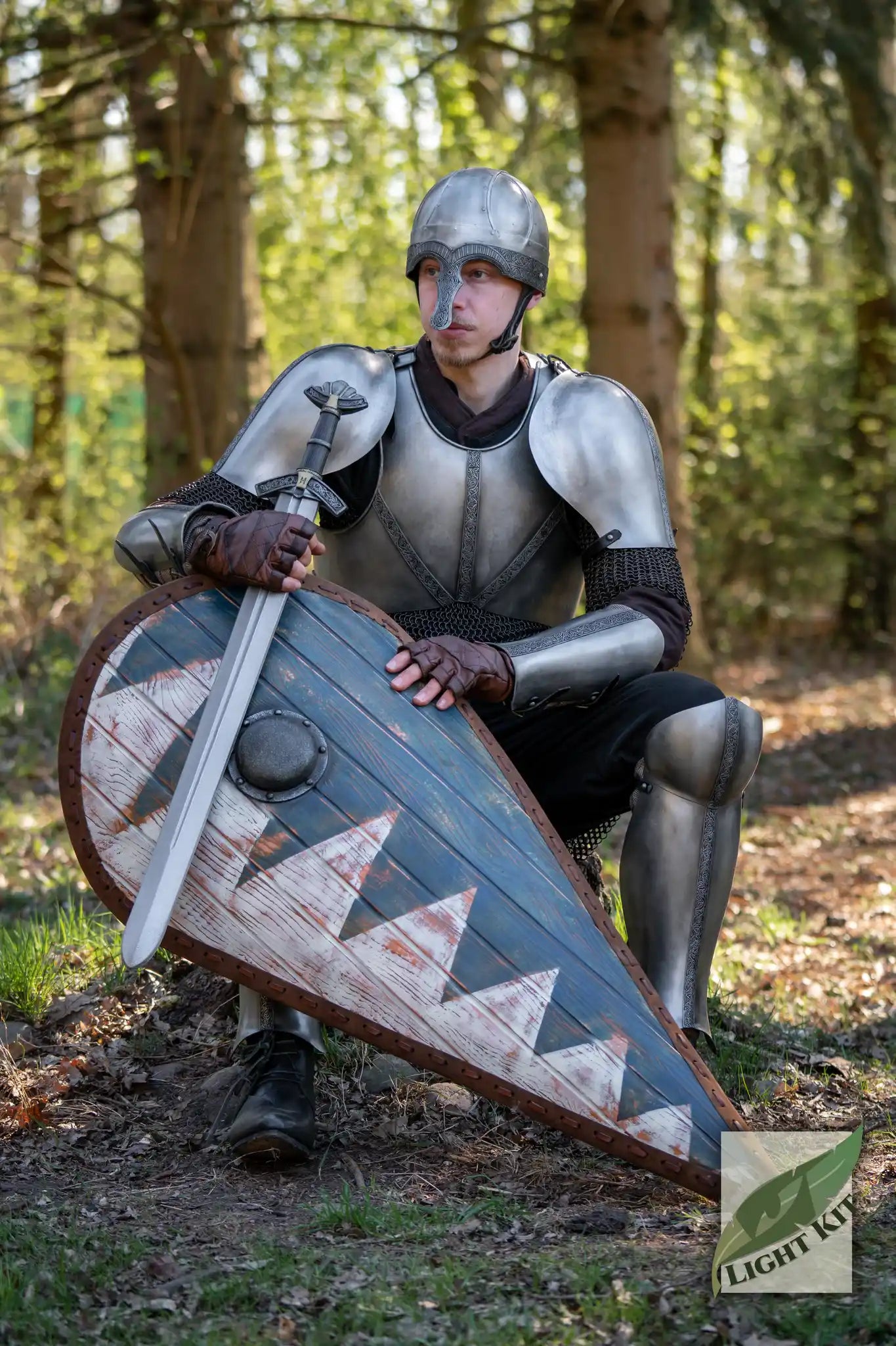 Knight in armor holding a foam sword and shield, perfect for LARP with Swords & Shields collection.