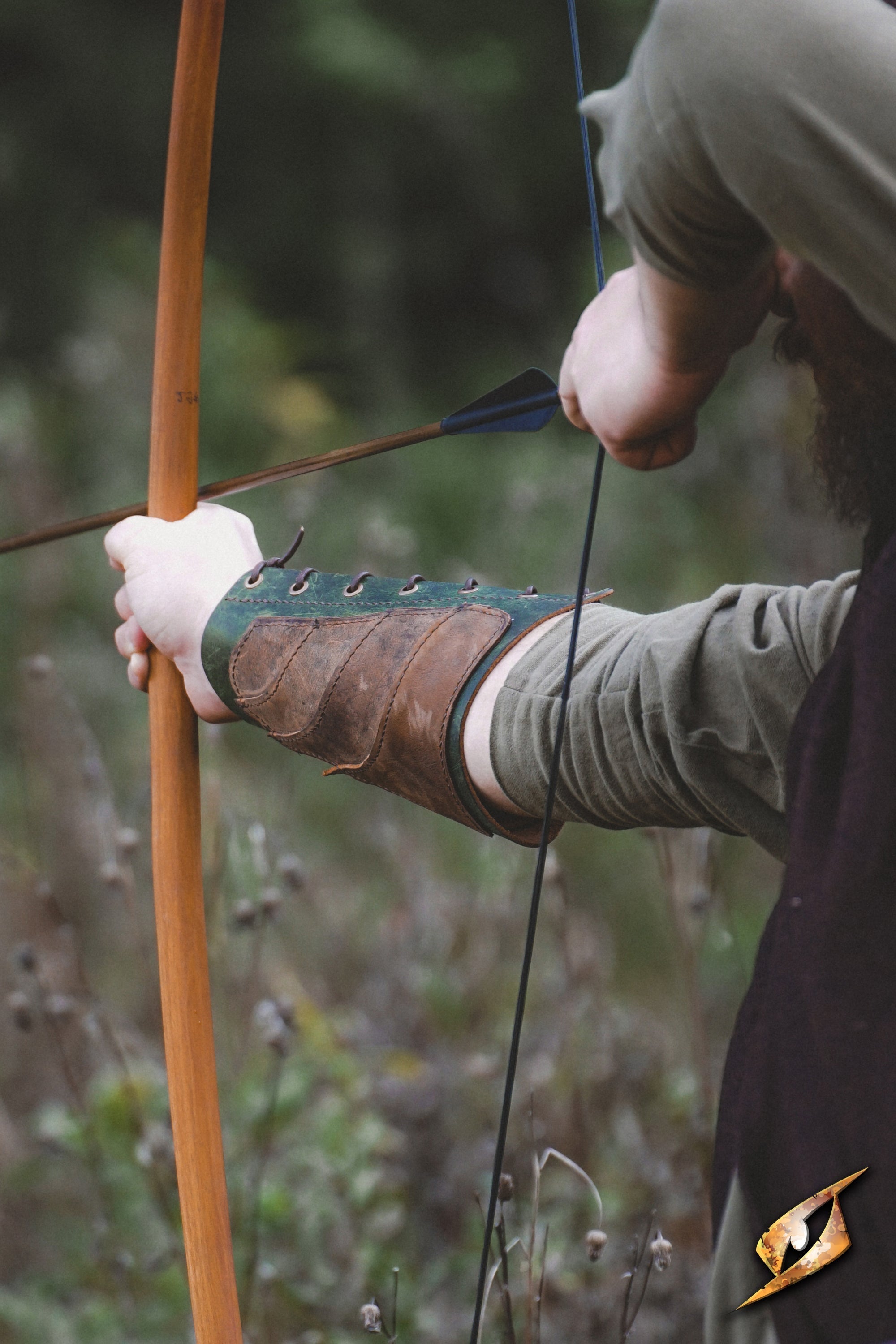 A close-up of an archer drawing a bowstring while aiming, showcasing the skill of Archery.