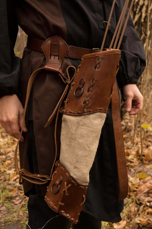 Quivers made of leather and fabric, showcasing a crafted pouch for storing arrows, perfect for archery enthusiasts.