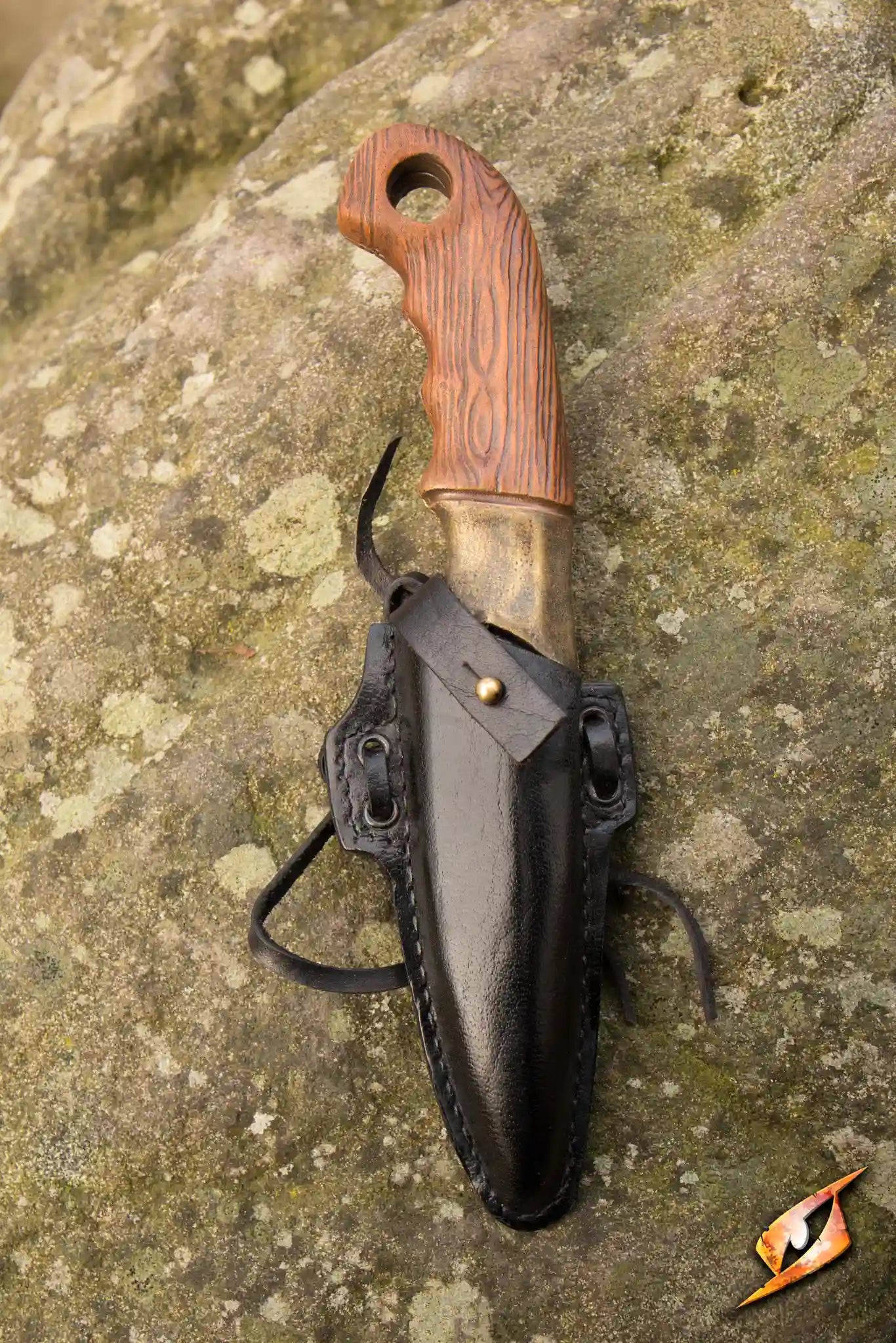Woodsman Knife & Holder featuring a brown handle and black leather holder, designed for secure use in combat.