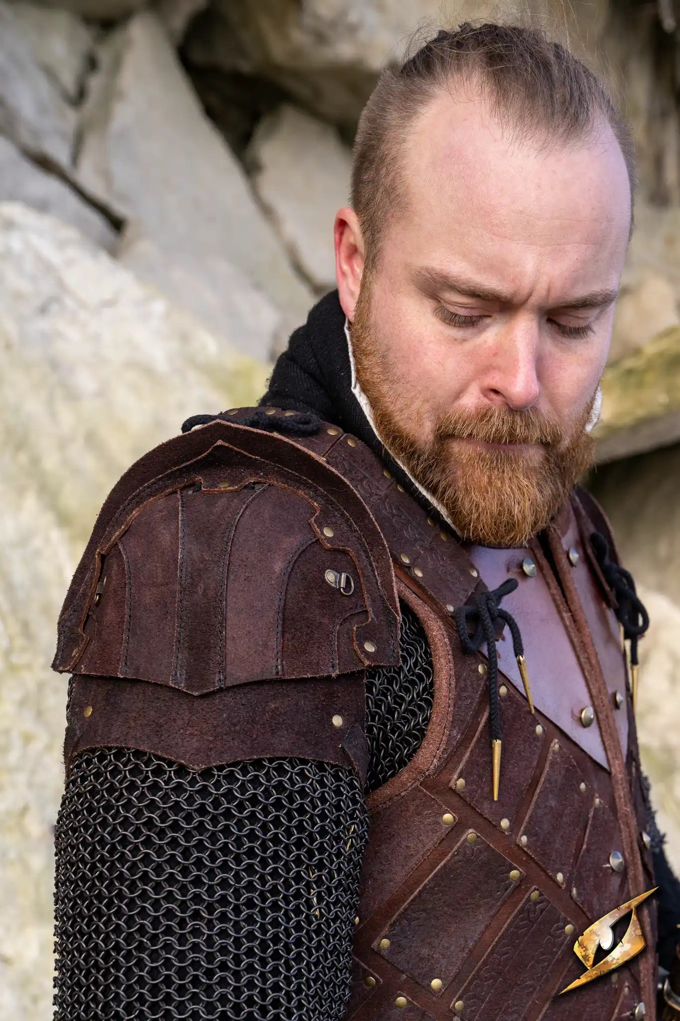 Woodsman Suede Shoulder Armour displayed on a man, showcasing its authentic LARP look and leather craftsmanship.