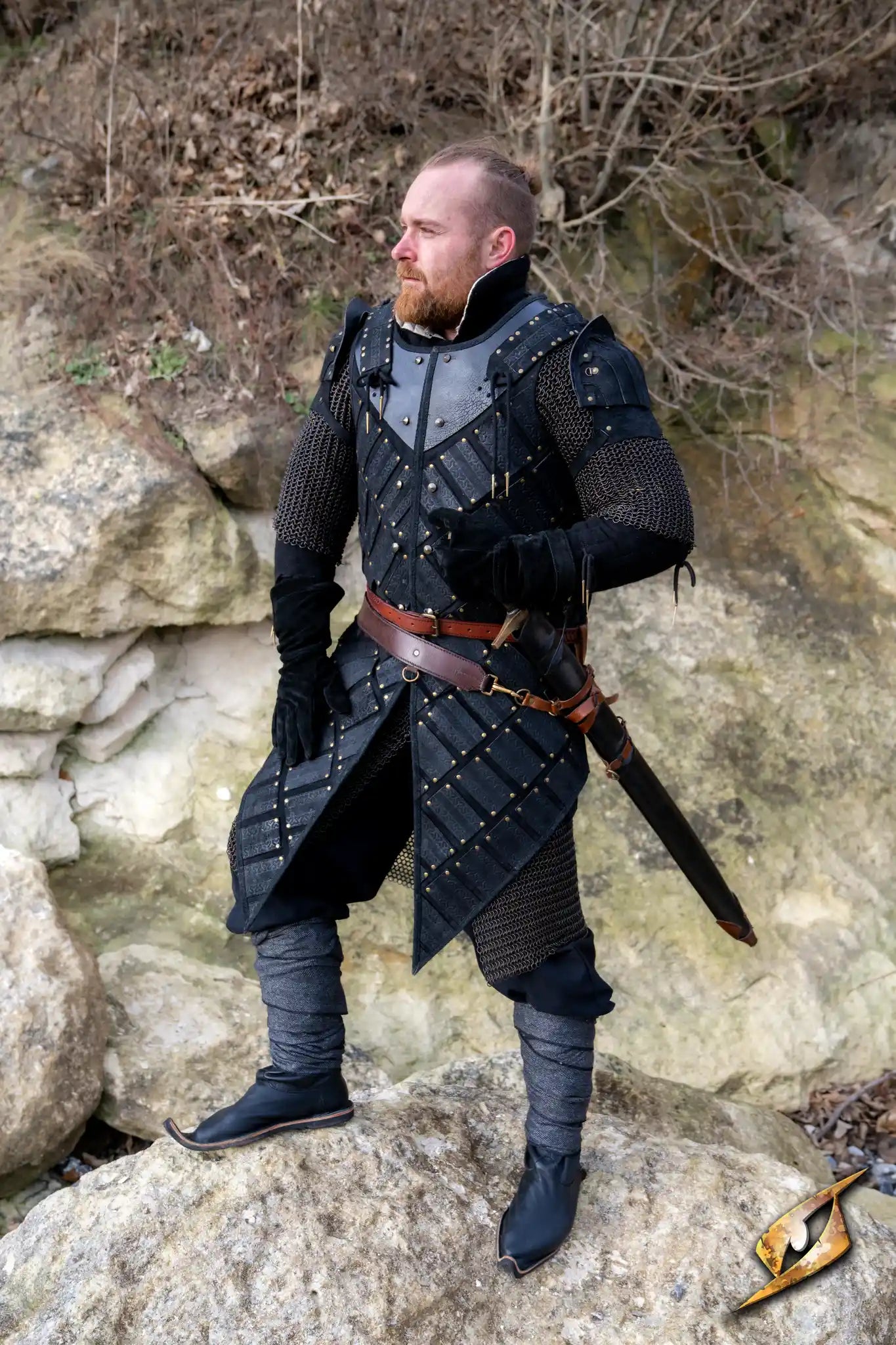 Woodsman Armour Suede in Epic Black worn by a man, featuring sturdy straps and comfortable fit.