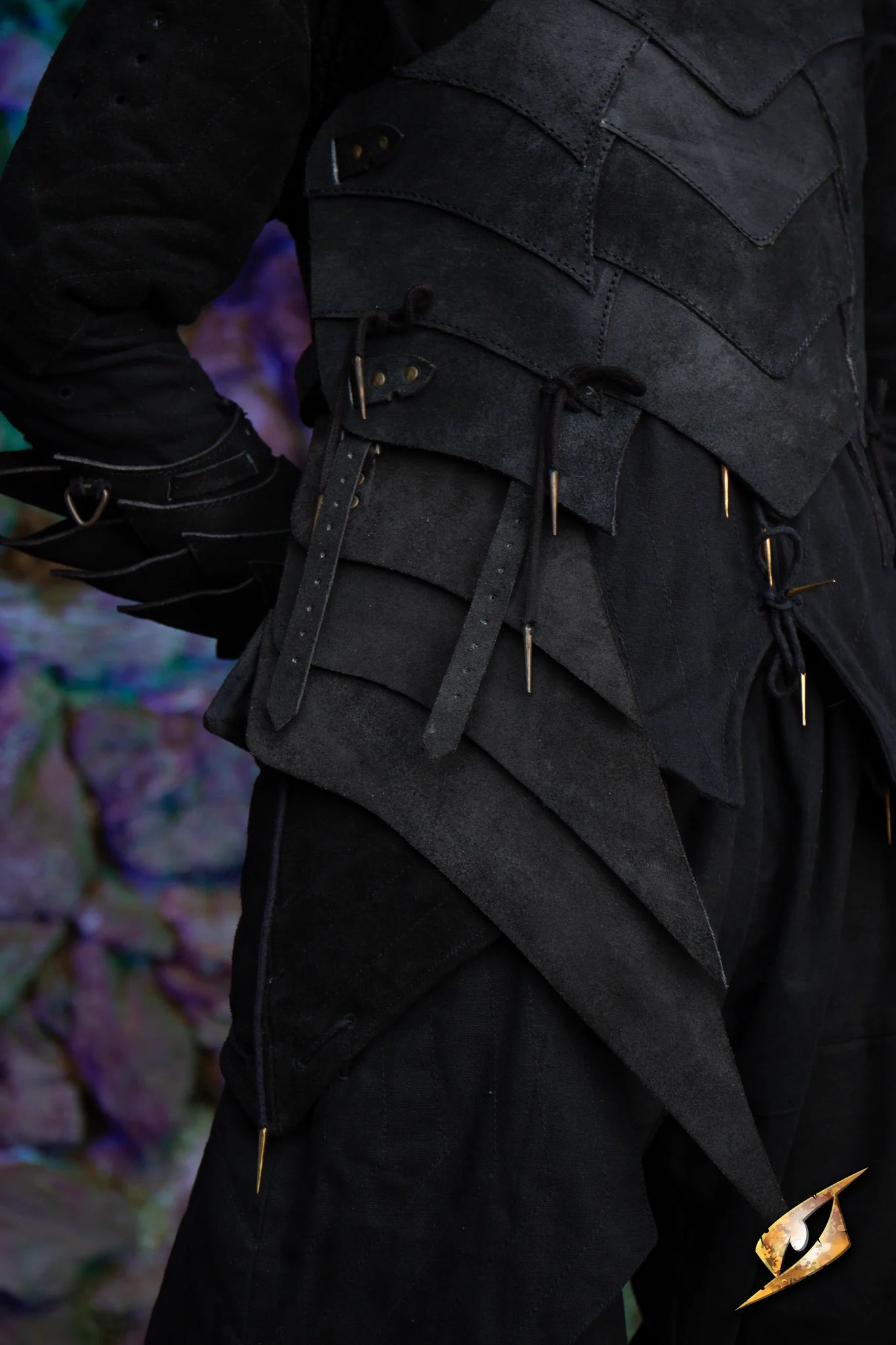 Close-up of Shadow Armour Tassets-Suede, showcasing layered suede design and intricate fastening details.