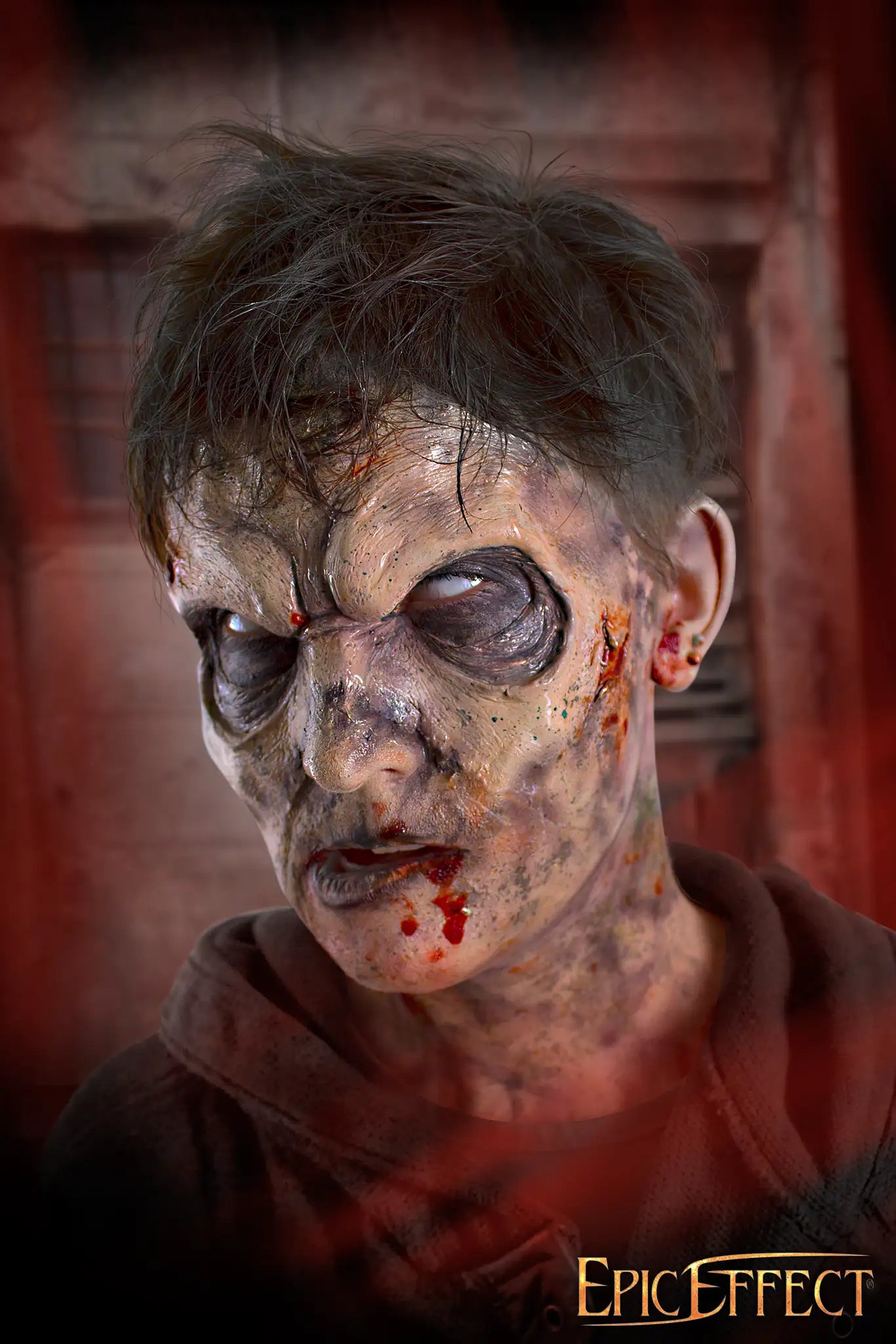 Zombie Brow latex prosthetic worn to create a rotting undead expression with deep-set brows and gashes.
