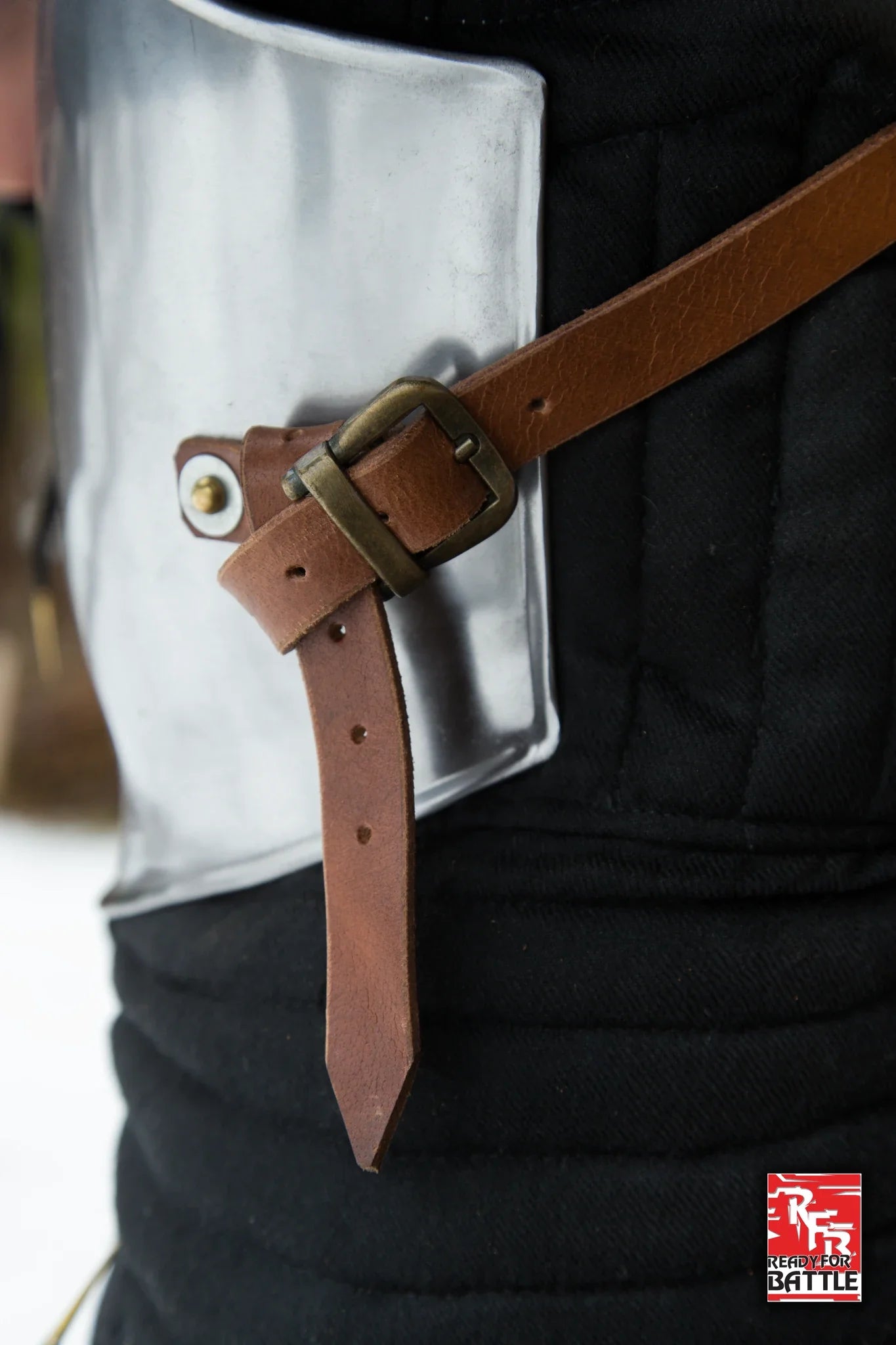 Close-up of RFB Breastplate with leather strap and buckles, showcasing detailed craftsmanship and secure fit.