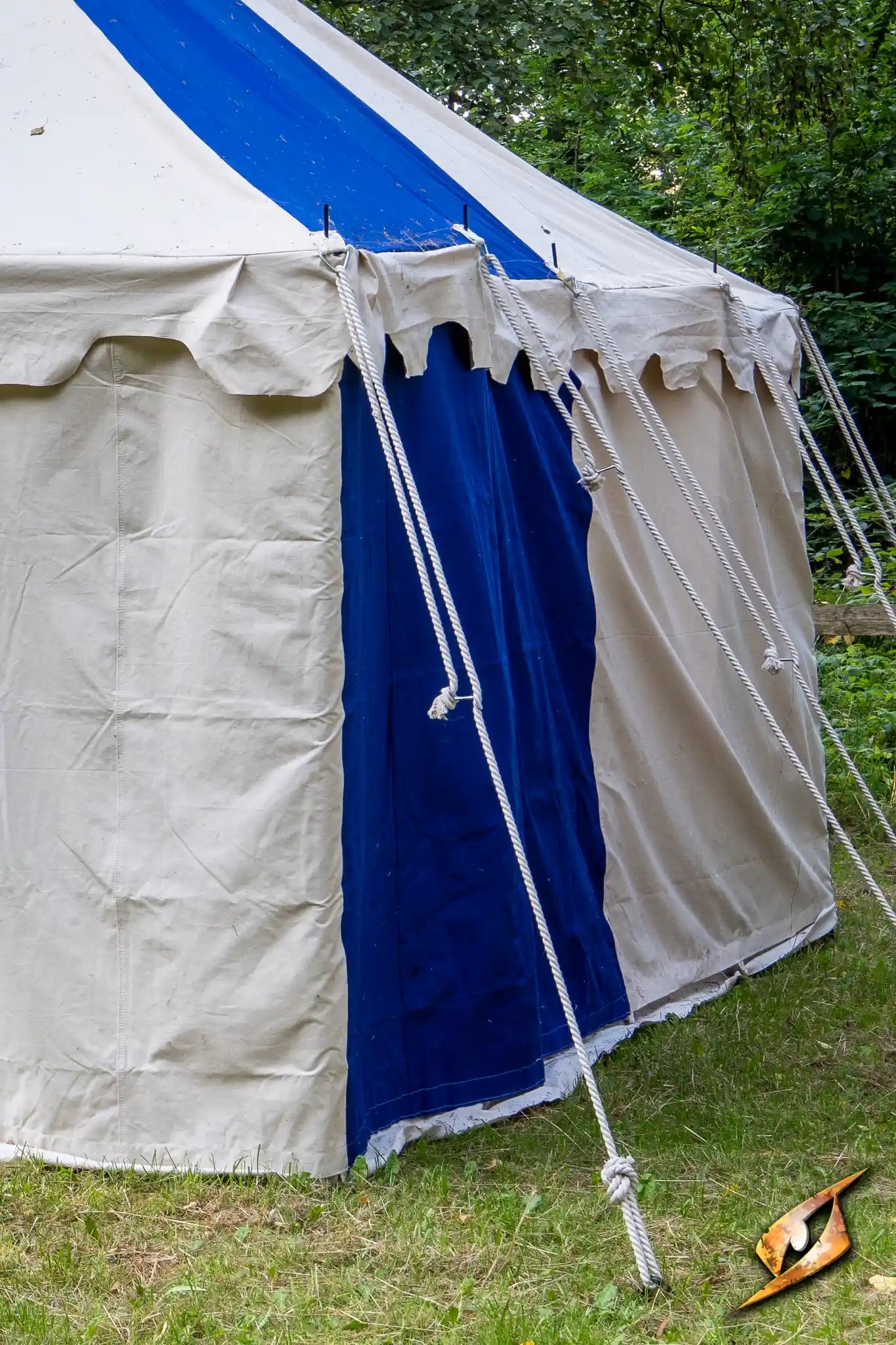 Marquee Tent - Sides - 5x8m showing blue sidewall and ropes securing the structure outdoors.