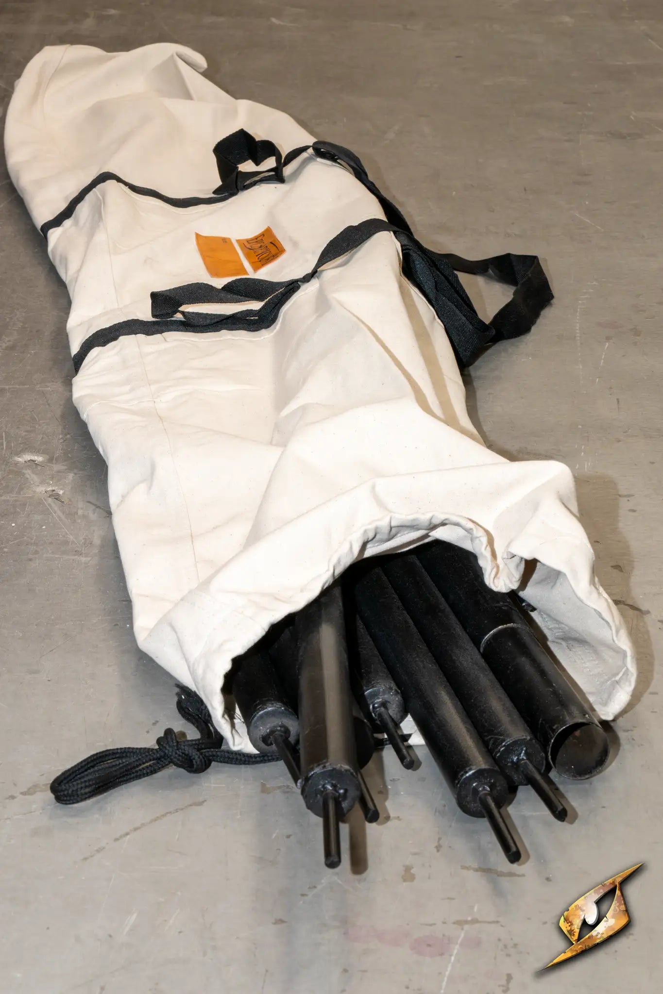 Pole Pack containing multiple tent poles in a durable carrying bag.