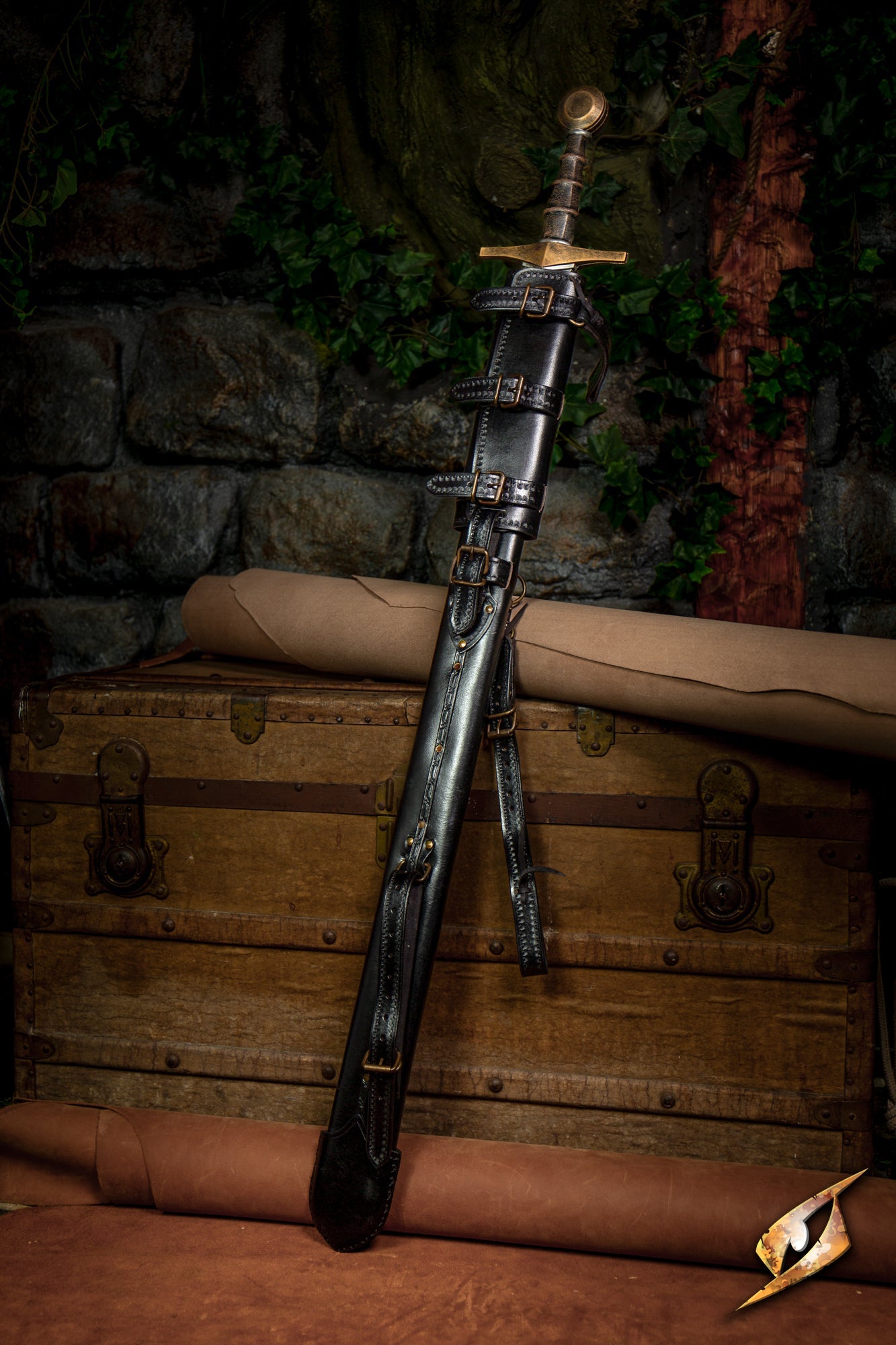 Adjustable Scabbard displayed with a sword on a wooden chest, showcasing its versatile design and craftsmanship.
