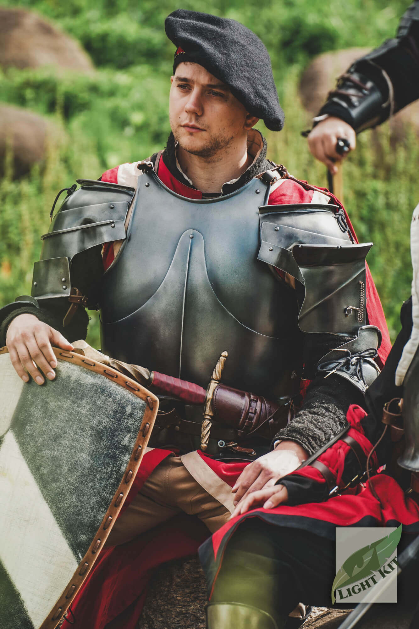 Milanese Pauldrons - Light Kit worn by a knight, showcasing agility and historical aesthetics in battle attire.