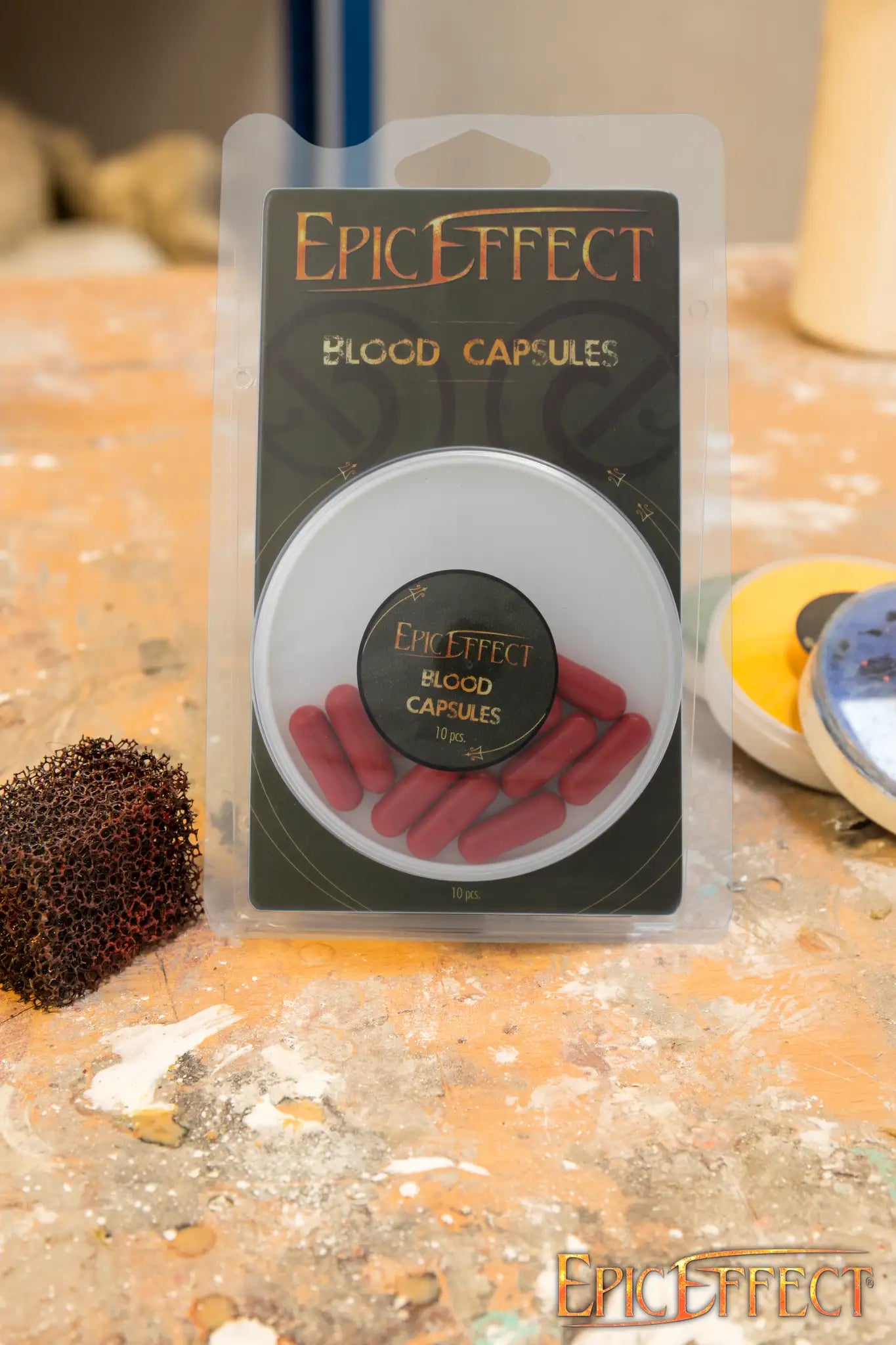 Blood Capsules 10 Pieces packaged by Epic Effects, featuring ten realistic blood capsules in a resealable case.