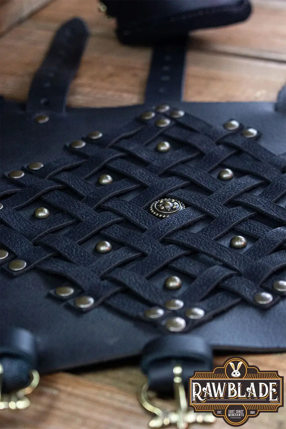 Brawley Studded Bracelets featuring a woven black leather design with gold rivets and durable straps.